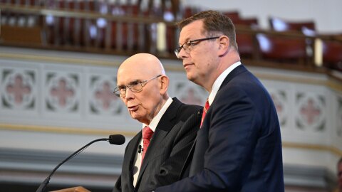 President Dallin H. Oaks (left) and Elder Clark G. Gilbert at a devotional for students of Ensign College in the Assembly Hall on Temple Square, May 17, 2022.