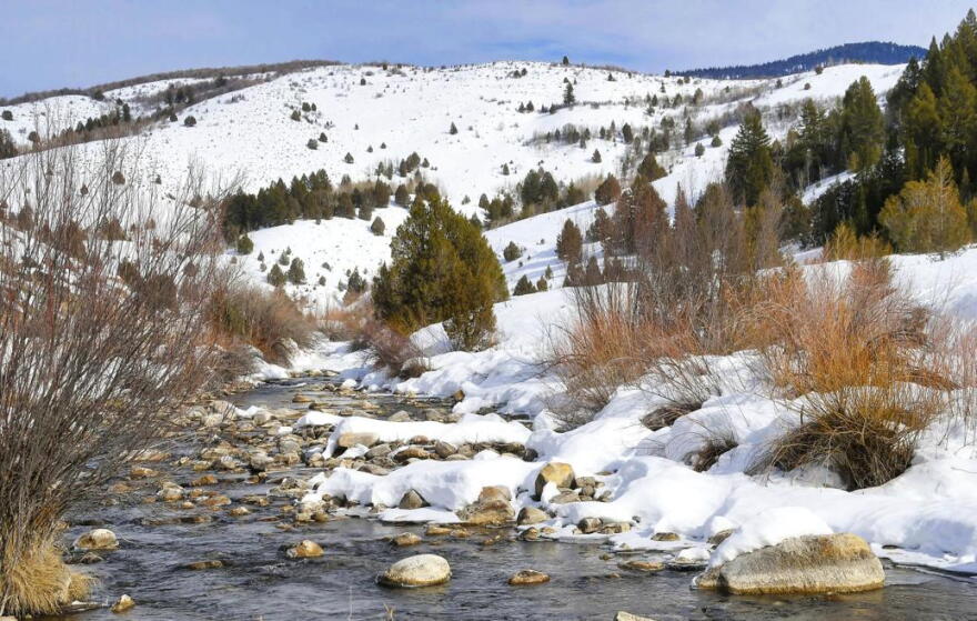 Snow covers the mountains in Logan Canyon near Ricks Spring on Wednesday.