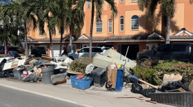 storm debris piled up on Treasure Island after Hurricane Helene