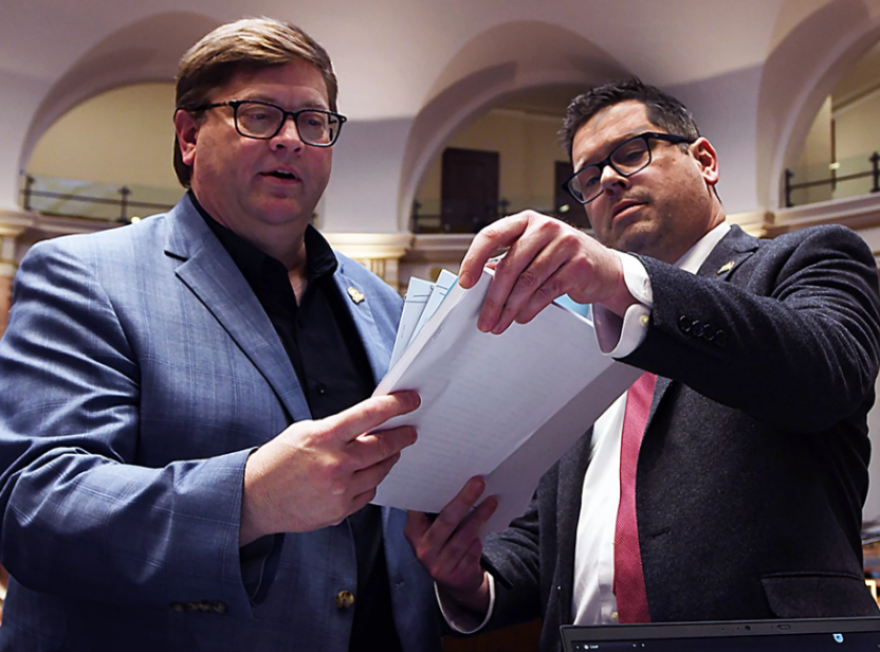 Republican Rep. Jason Petrie, of Elkton, (left) and House Majority Floor Leader Steven Rudy, of Paducah, look over various proposals for the state’s next biennial budget.