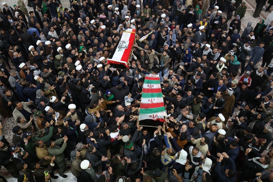Mourners carry the coffins of Gen. Qassem Soleimani and Abu Mahdi al-Muhandis in Najaf, Iraq.