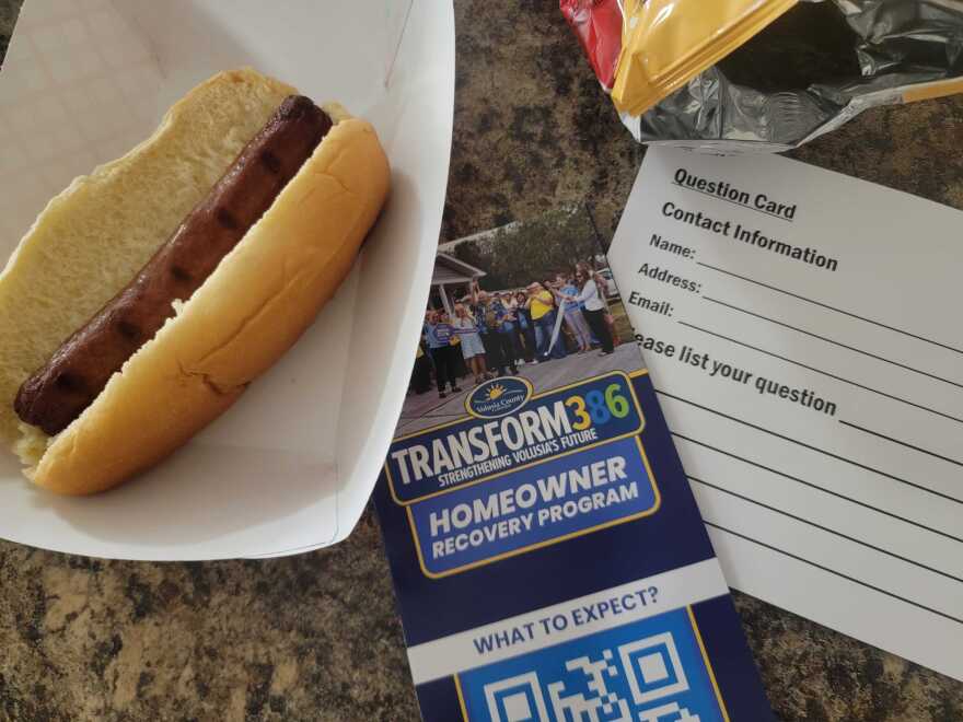 Volusia County workers with the Transform386 team welcomed locals with grilled hotdogs, games and toys for children.