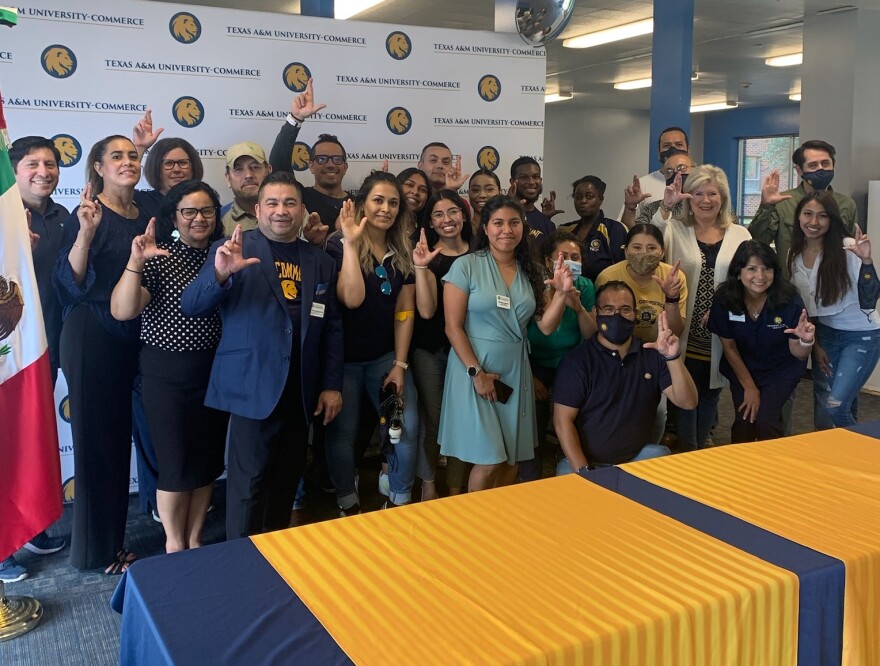 A&M-Commerce employees pose for a photo with Mexican consulate officials at the university's Smith Residence Hall.