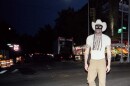 Orville Peck walking down the street 