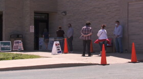 Voters line up to cast ballots at Edgewood High School on June 2th, 2020.