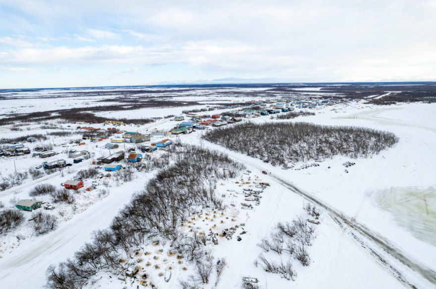 Dog kennels, bottom center, dot the banks of the Kuskokwim River in the mushing hotbed of Akiachak, a Native village in Western Alaska.