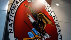 The logo of the National Rifle Association is seen at an outdoor sports trade show in Harrisburg, Pennsylvania.