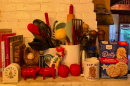 The writer's kitchen counter, featuring “a cup of ambition” and Parton-brand sugar cookie mix.