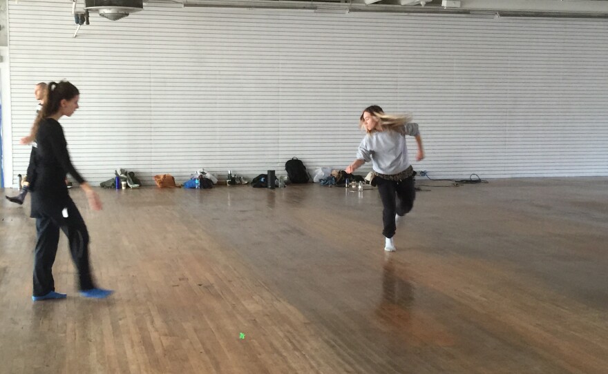 Choreographer Kate Wallich rehearses with dancers in the new V2 udio
