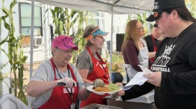 Volunteers serve meals at the Crossroads Rescue Mission's three days of Thanksgiving on November 25, 2025.