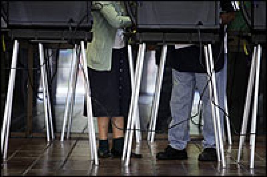 Florida voters cast ballots with touch-screen voting machines Jan. 14, the first day of early voting in the 2008 presidential primary at the Stephen P. Clark Center in Miami.