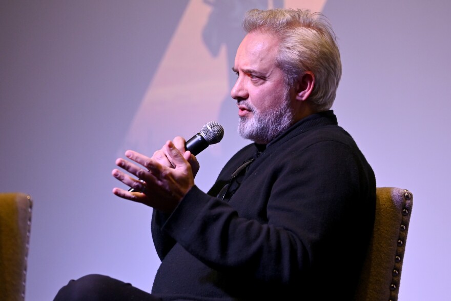 Sam Mendes speaks onstage at a special screening of <em>1917</em> earlier in December.