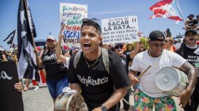 RICKY RENUNCIA: Puerto Ricans march in San Juan this week demanding Governor Ricardo Rossello's resignation. (The black T-shirts say Ricky, Resign)