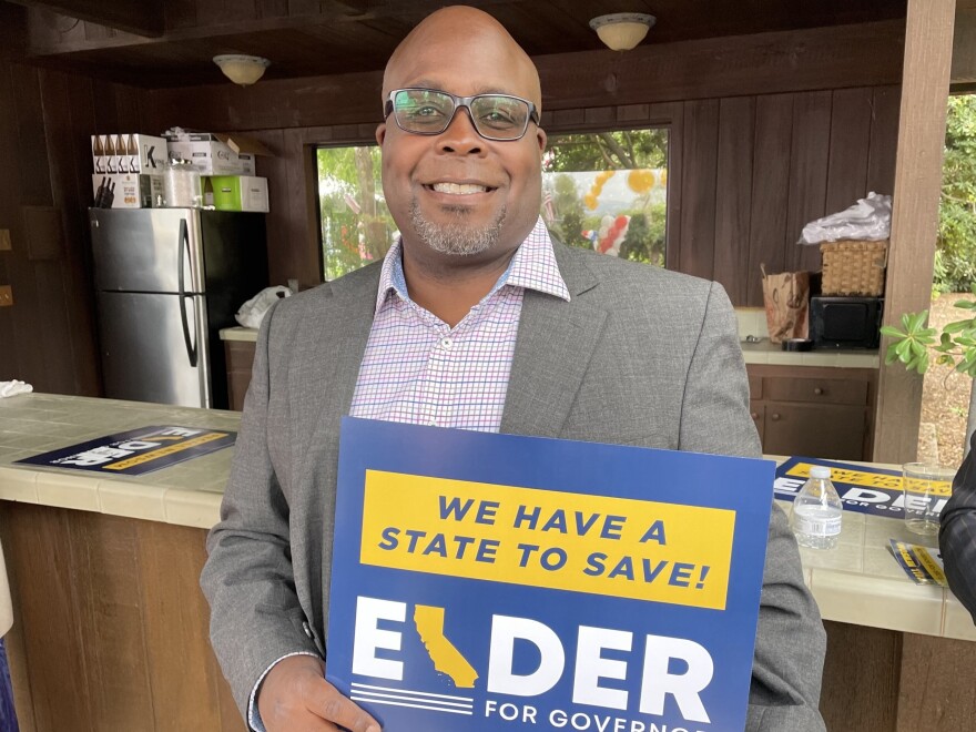 Chris McGee, the Westminster city chair for the Orange County Republican Party, attends an rally and fundraiser for gubernatorial candidate Larry Elder on Aug. 21.