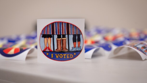 a sticker says "I voted" with feet