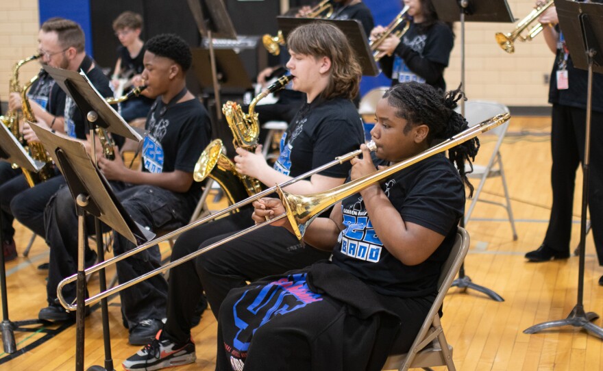 Students from Gordon Parks Academy perform at the public walkthrough of the historic Chester Lewis school building.