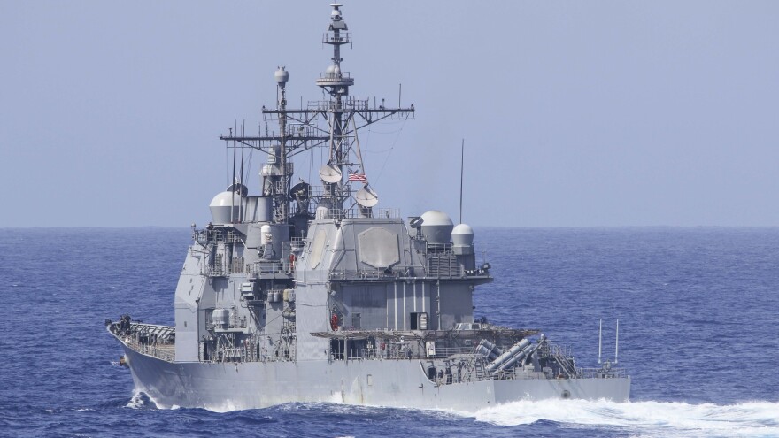 The Ticonderoga-class guided-missile cruiser USS Chancellorsville was forced to "execute all engines back full" and move out of the way of a Russian destroyer in the Philippine Sea, the U.S. Navy says. The Chancellorsville is seen here during a training exercise in the Pacific Ocean.