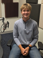 Gavin Kornack at the mic in NPR Illinois Studio F.