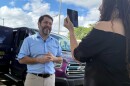 Senator Ruben Gallego, has his photo taken while he campaigns with Eileen Higgins during her campaign for Miami Mayor on Sunday, Dec. 7, 2025 in Miami. (AP Photo/Adriana Gomez)