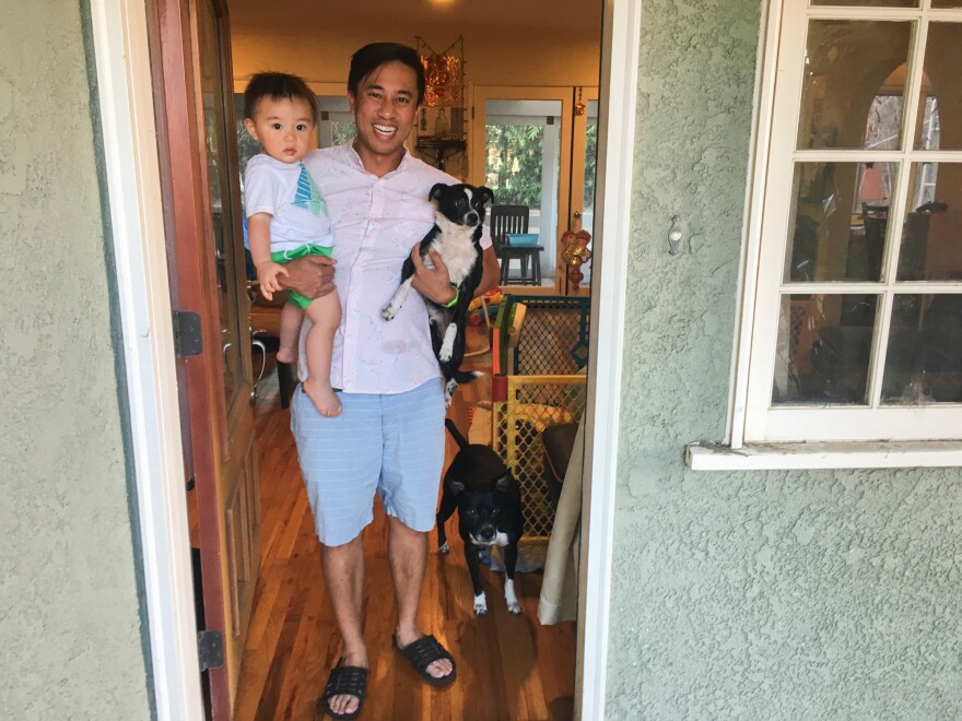 Nguyen Tran and his son Cillían, together with their two dogs Oreo and LeBeouf.