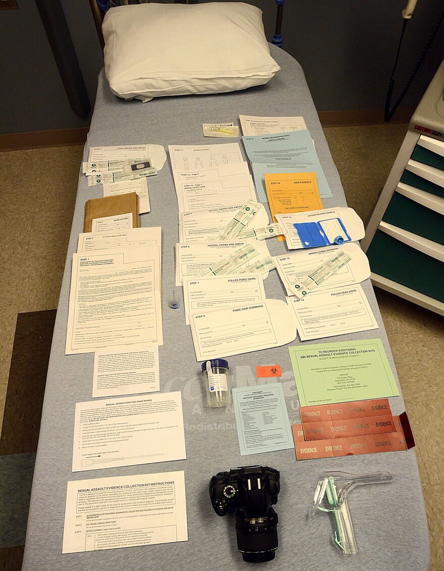 Some of the numerous components of a sexual assault evidence collection kit.