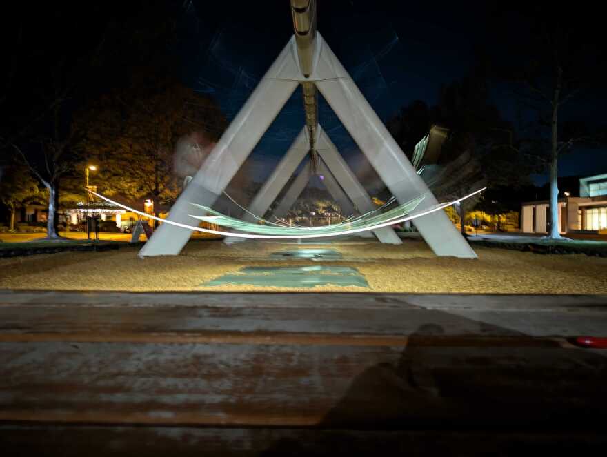 The Musical Swings are lit up at night, shown in a long exposure shot on April 15, 2026.