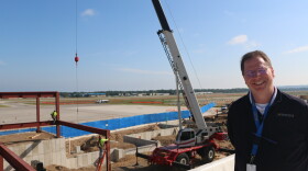 Cherry Capital Airport director Kevin Klein on the roof of Concourse A, overlooking construction of Concourse B. (Photo : Austin Rowlader / IPR News)