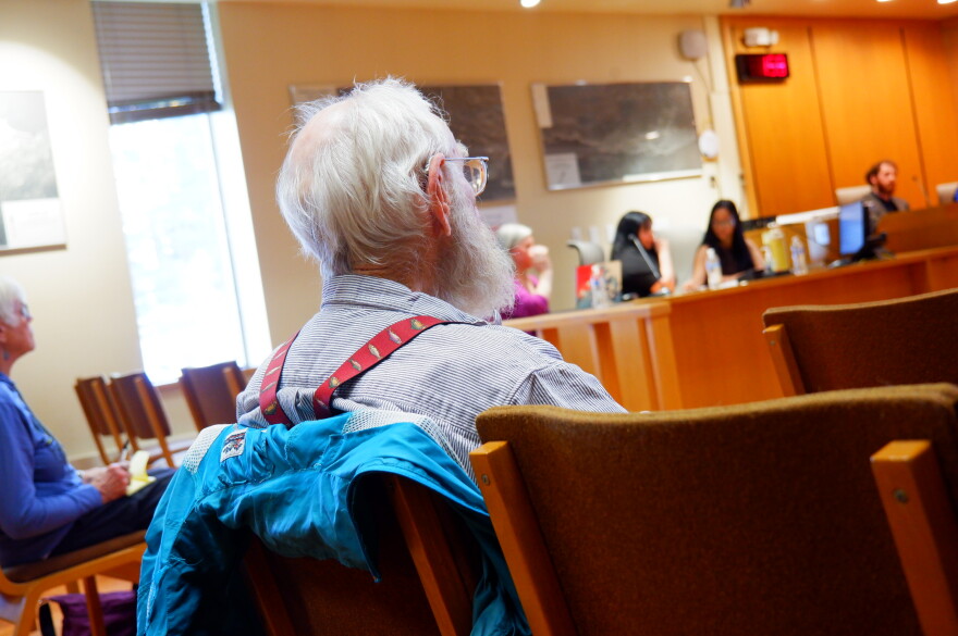 Former ADF&G employee Pat Holmes listens to the Borough Assembly Candidates Forum on Sep. 8.