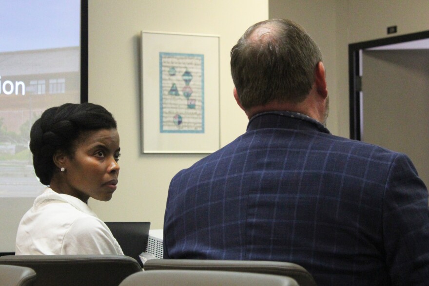 Federal Communications Commissioner Olivia Trusty listens to Kenai Peninsula Borough School District Superintendent Clayton Holland speak during a meeting on Wednesday, Aug. 20, 2025 in Soldotna, Alaska.