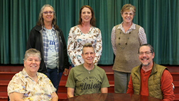 The Pierce County Labor Community Services Agency recently purchased an old Tacoma elementary school. The nonprofit plans to turn it into a childcare center. Pierce County Labor Community Services Agency Board Members Front Row, Left to Right: Patty Rose, Treasurer; Alice Phillips, 1st Vice President; Nathe Lawver, President Back Row, Left to Right: Chris Hall, 2nd Vice President; Rachael Geyer, Trustee; Kimberlie Lelli, Secretary.