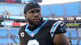 FILE - Carolina Panthers linebacker Brian Burns walks on the field following an NFL football game against the Tampa Bay Buccaneers, Jan. 7, 2024, in Charlotte, N.C. The New York Giants have agreed to acquire edge rusher Burns from the Panthers, a person familiar with the deal told The Associated Press, Monday, March 11, 2024. Burns is getting a five-year contract worth up to $150 million with $87.5 million in guarantees, according to the person who spoke to the AP on condition of anonymity because the deal cannot be completed until Wednesday. (AP Photo/Erik Verduzco, File)