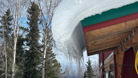Snow melting from the roof of a Fairbanks home in mid-April 2026.