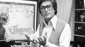 Paramount Pictures production chief Robert Evans talks about his film "Chinatown" in his office in Beverly Hills, Calif., in 1974. (AP Photo/Jeff Robbins)