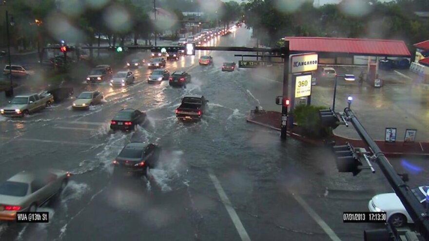 A flooded street intersection. 