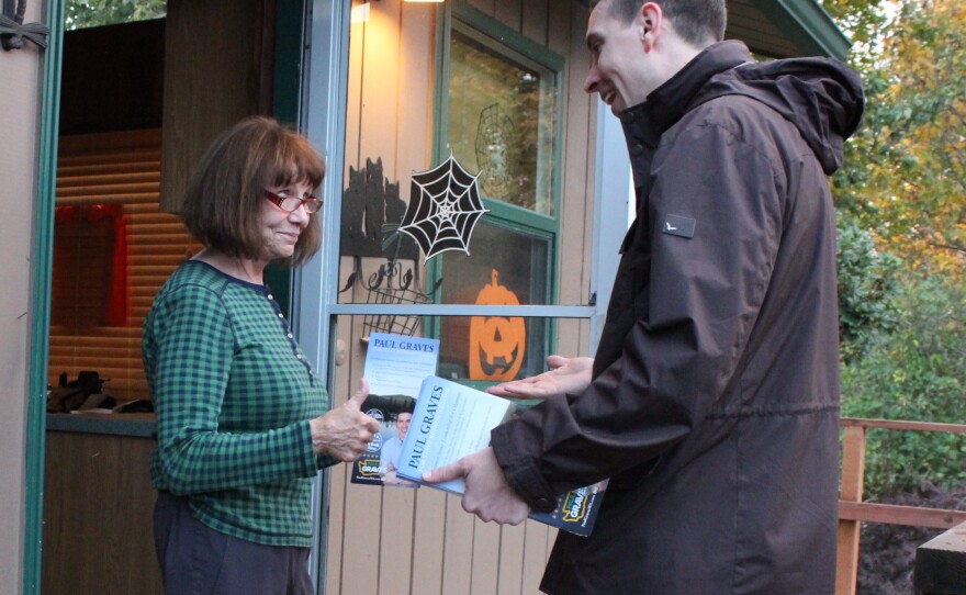 Paul Graves, Republican candidate in the 5th Legislative District, speaks with Jackie Treadwell on her porch in Maple Valley.