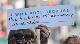 A small group of local Democrats rallied outside the Indianapolis offices of Sen. Todd Young (R-Ind.) and Sen. Mike Braun (R-Ind.) Monday in the wake of Supreme Court Justice Ruth Bader Ginsburg's death.