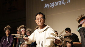 Cama-i’s Living Treasure, Cikiigaq Joe Ayagarak Jr. of Chevak, performs a solo dance with the Yurartet Singers and Dancers at the Cama-i Dance Festival at Bethel Regional High School on March 29, 2019.