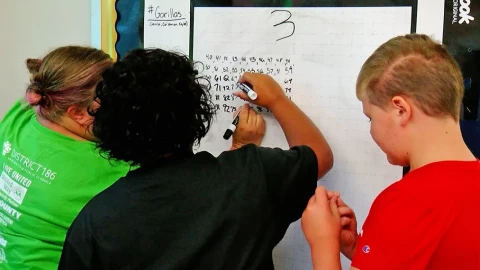 Students do math problems at an elementary school in Springfield.
