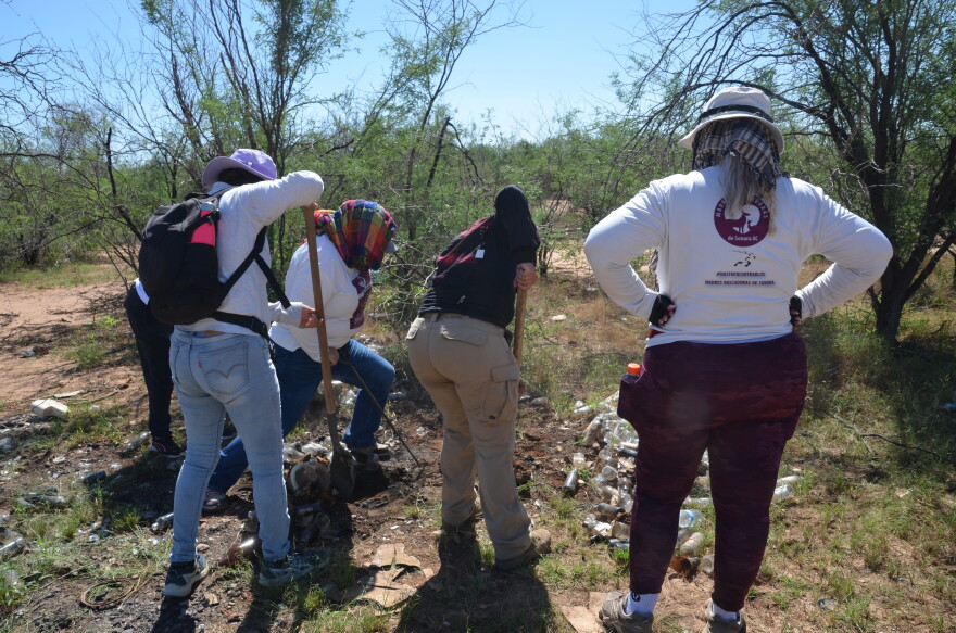 A group of Madres Buscadoras de Sonora digs up a spot they think could be a grave during a search in Hermosillo.