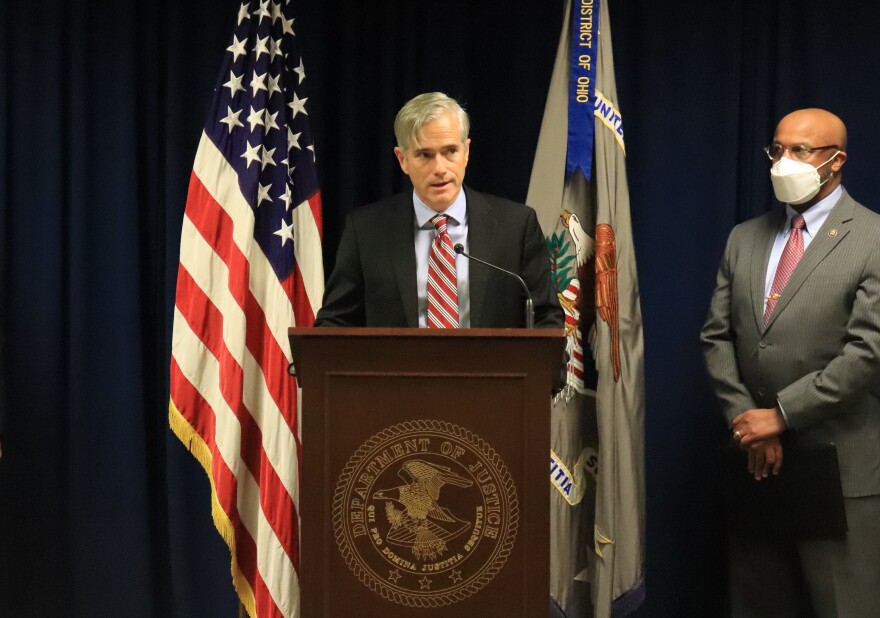 U.S. Atty. David DeVillers (speaking) and ATF Special Agent in Charge Roland Herndon at a press conference announcing the new prosecution strategy.