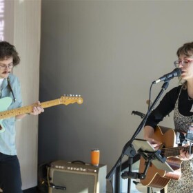 Patrick Mahoney Jr and Kennedy Hall perform at the CMC forum