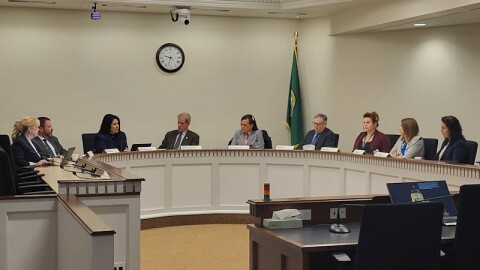  Lawmakers on the House Community Safety, Justice and Reentry Committee discuss I-2113 before voting it out of committee Friday, March 1, 2024. The initiative would ease certain rules around when police can pursue fleeing vehicles, undoing limits put in place by the Legislature in 2021 that were already changed last year.