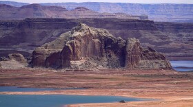 FILE - Low water levels at Wahweap Bay at Lake Powell along the Upper Colorado River Basin are pictured, June 9, 2021, at the Utah and Arizona border at Wahweap, Ariz. In a vote on Thursday, May 23, 2024, the Navajo Nation Council has unanimously approved a proposed water rights settlement that carries a price tag larger than any such agreement enacted by Congress. (AP Photo/Ross D. Franklin, File)