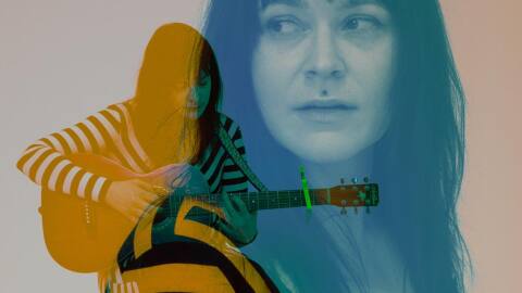 Two images of Silver Reeds imposed over each other with blue and yellow hues. One photo is her sitting on a stool and playing a guitar. The other is her standing to the left and looking over her right shoulder.