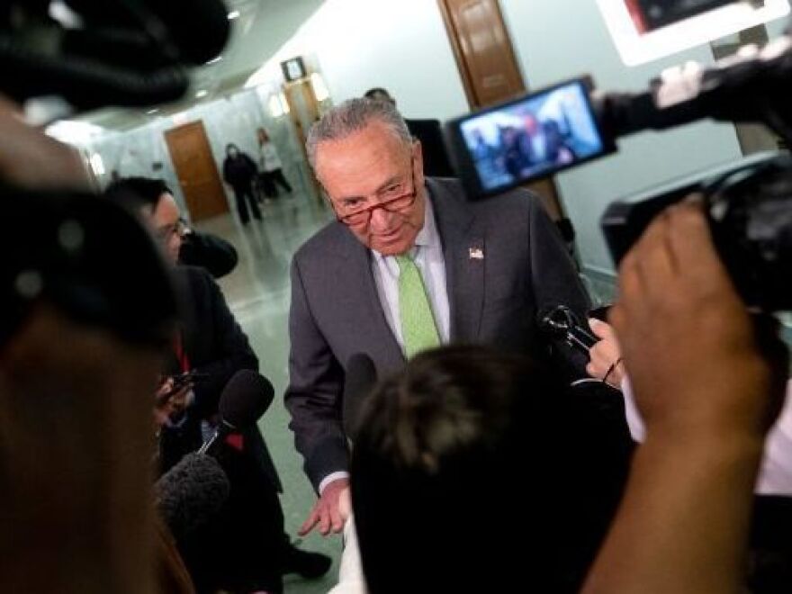 Senate Majority Leader Chuck Schumer, D-N.Y., speaks to reporters April 27 outside the Senate Judiciary Committee on Capitol Hill in Washington.