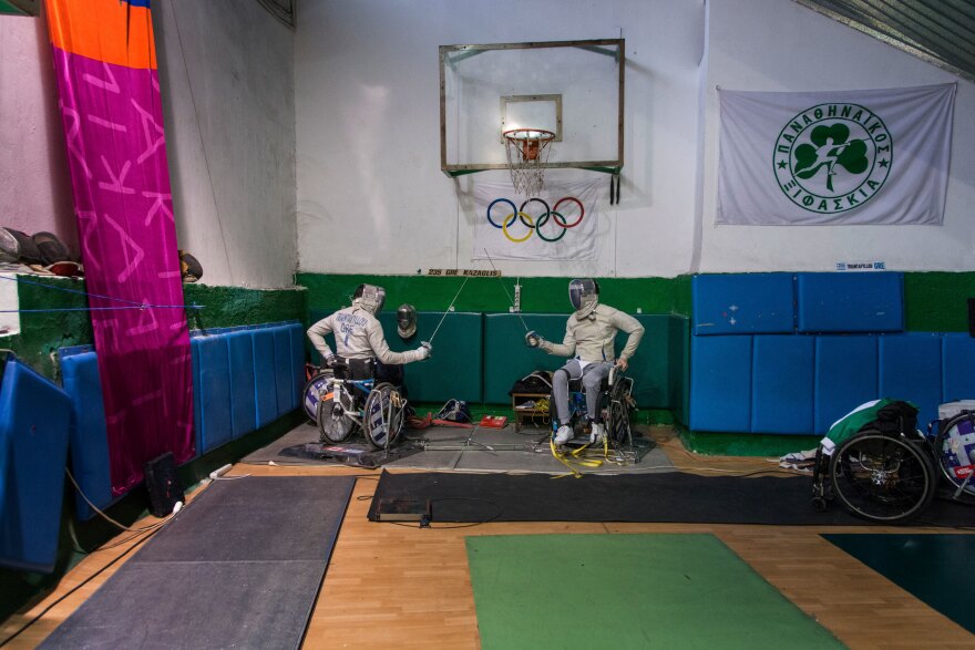 Triantafyllou (left) and Ntounis practice inside the small indoor court in Athens' Apostolos Nikolaidis Stadium, where Greece's national team consisting exclusively of people with disabilities is training.