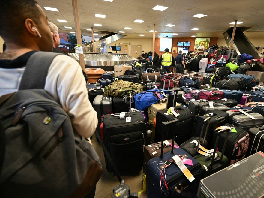 Newly arrived Southwest Airlines passengers wait for their luggage to arrive at Hollywood Burbank Airport in Burbank, California, on Tuesday.