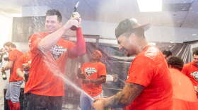 Rochester Red Wings players celebrate their International League championship on Thursday, after trailing 2-1 in the eighth inning.