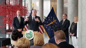 Gov. Eric Holcomb speaks at Caterpillar Headquarters in Downtown Indianapolis before signing SEA 50 into law that forms the Governor's Workforce Cabinet. (Samantha Horton/IPB News)