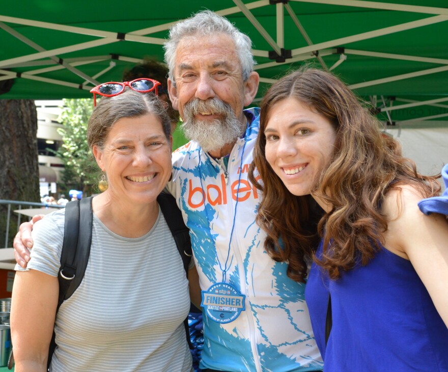 Jerry Baker is seen with wife Deborah Stephenson and daughter  Julia Baker after he finished this year's Seattle to Portland ride — his 36th STP.